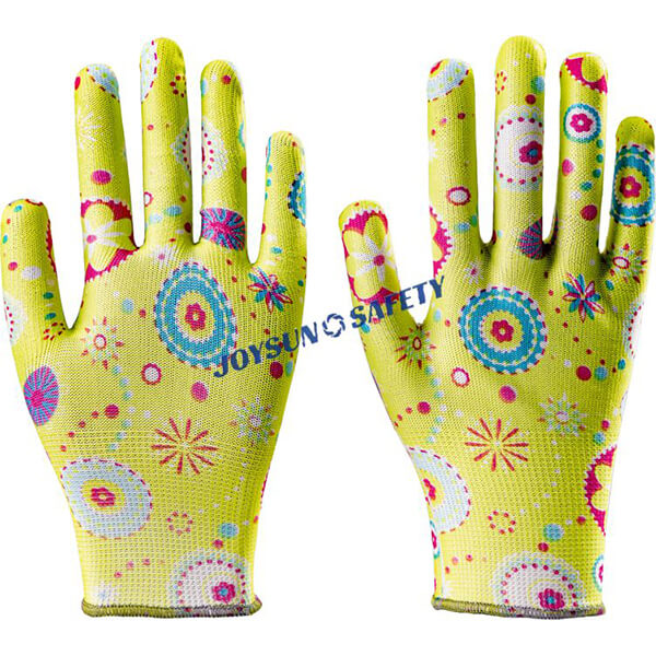 A pair of yellow Joysun Safety G001 gardening gloves with a floral pattern, designed for women.